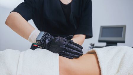 Young girl is relaxing in the spa. Physiotheraphy.の写真素材