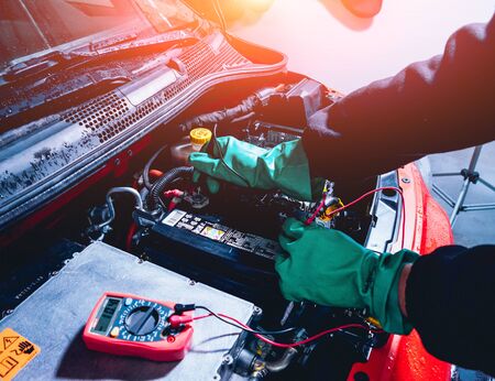 Electic car with open hood. Details of electric car engine. Battery.の写真素材