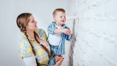 Happy family in new house. Construction and renovationの写真素材