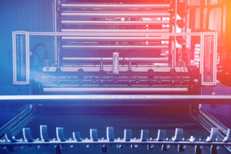 Modern automated production line in factory. Plastic bag manufacturing process. Backgroundの写真素材