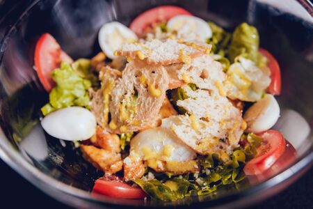 Leaf vegetable salad with olives and cheese feta. Restaurant backgroundの写真素材
