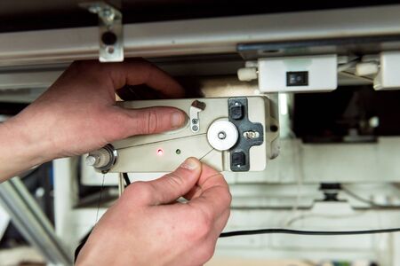 Fabric industry production line. Textile factory. Working tailoring processの写真素材