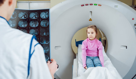 Medical equipment. Doctor and patient in the room of computed tomography