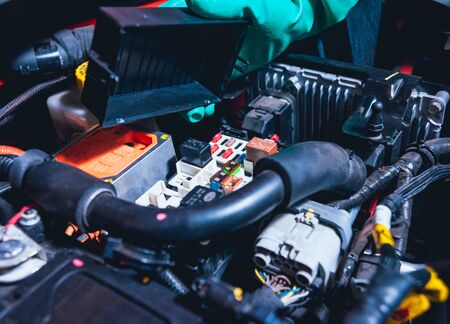 Electic car with open hood. Details of electric car engine. Battery.の写真素材