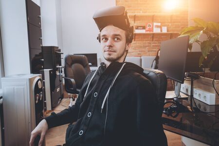 The young man wearing virtual reality gogglesの写真素材