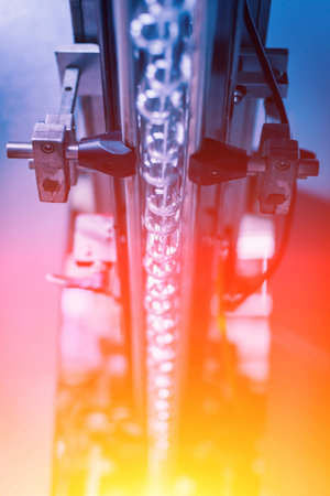 Automatic filling machine pours water into plastic PET bottles. Brewing production. Industrial...
