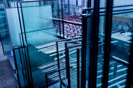 Window profile cut of metal, glass and insulation. Backgroundの写真素材