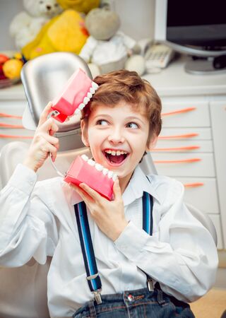 Little boy at the dental office. Calm and happy.の写真素材