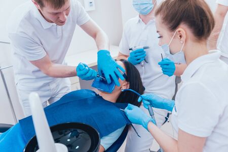 Obturation of root canals during endodontic treatmentの写真素材