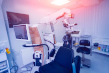 Hi-Tech operating room for ophthalmic surgery. Vision correction. Bloored backgroundの写真素材