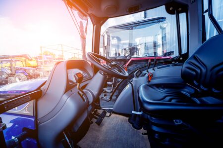 Modern tractor cabin interior. Agricultural exhibition. Industrial details.の写真素材