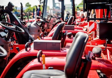 Rows of modern tractors. Industrial details. Agricultural exhibitionの写真素材