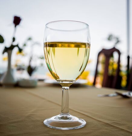 Wine in the glasses on the table. Backgroundの写真素材