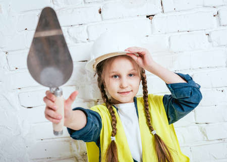 Little girl on the white background. Constructionの写真素材