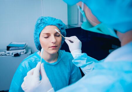 Preparation for laser correction of vision. Surgeon and the patientの写真素材