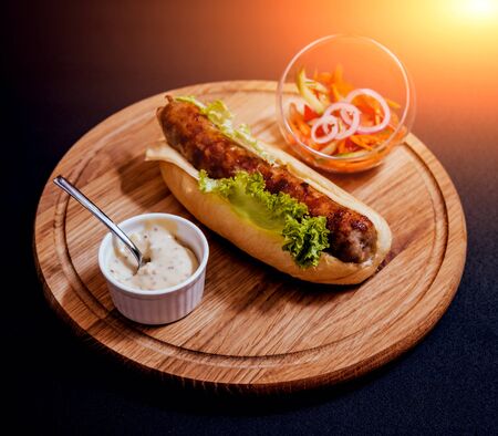 Grilled chicken seekh kebab with fresh bun and cheese.の写真素材