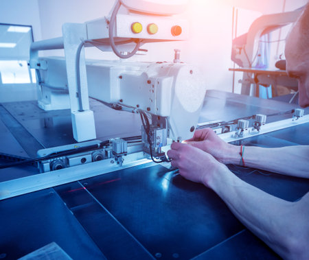 Fabric industry production line. Textile factory. Working tailoring process cloth. Modern equipment
