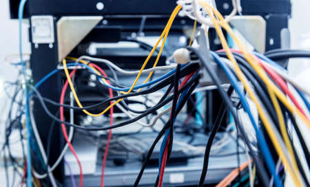 Server room with computers for internet. Network cables connected to switches.の写真素材