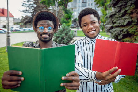 African students in the park. Beautiful backgroundの写真素材