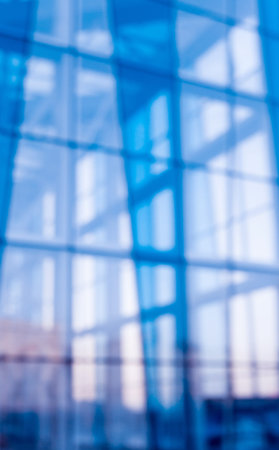 Abstract image of the glass facade of a modern building. Blured background