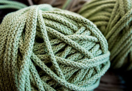 Ball of yarn on the table. Material for knitting. Beautiful backgroundの写真素材