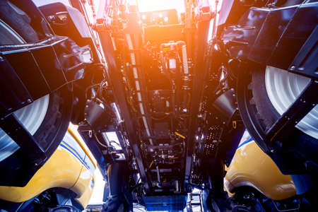 Modern agricultural machinery and equipment. Yellow agricultural harvester. Combine.の写真素材