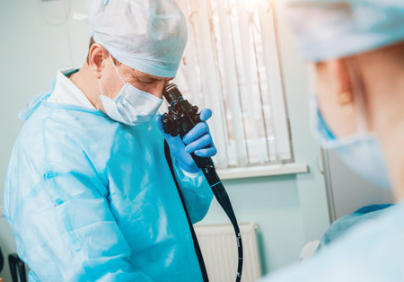 Endoscopy at the hospital. Doctor holding endoscope before gastroscopy