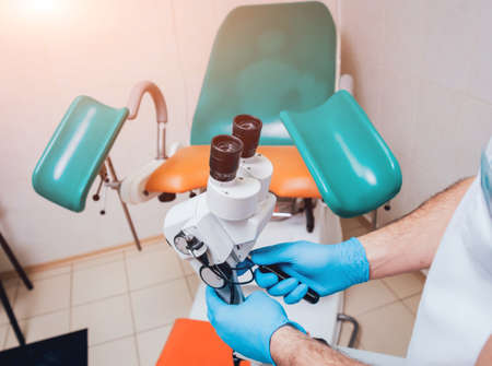 Gynecologist working with colposcope in clinic. Medicalの写真素材