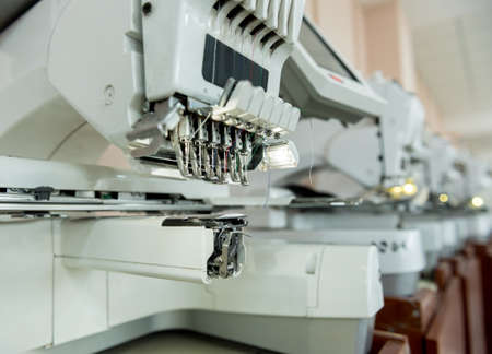 Fabric industry production line. Textile factory. Working tailoring processの写真素材