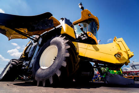 Modern agricultural machinery and equipment. Yellow agricultural harvester.の写真素材