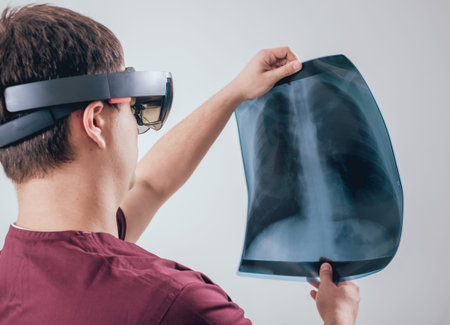 Doctor uses augmented reality goggles to exam x-rays film