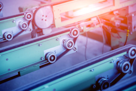 Conveyor belt for production a window pane. Industrial equipment.