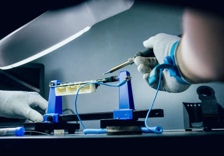 Repair of electronic devices, soldering and circuit boardの写真素材