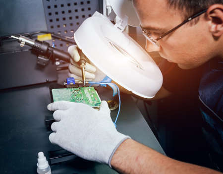 Repair of electronic devices, soldering and circuit boardの写真素材