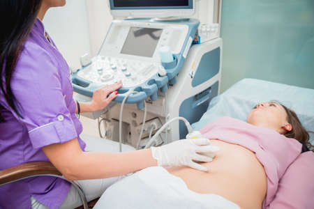 Doctor and patient. Ultrasound equipment. Diagnostics and sonographyの写真素材