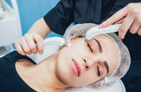 Cosmetic medicine. Mesotherapy medical devices. Light background.の写真素材