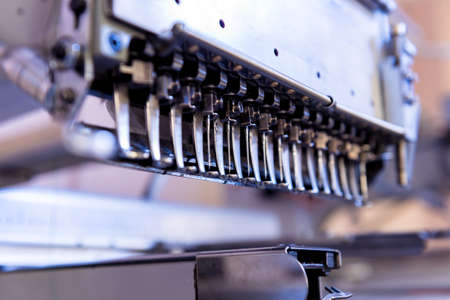 Fabric industry production line. Textile factory. Working tailoring processの写真素材