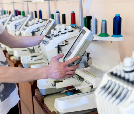 Fabric industry production line. Textile factory. Working tailoring process