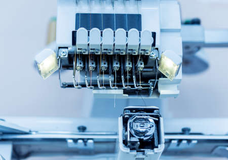 Fabric industry production line. Textile factory. Working tailoring processの写真素材