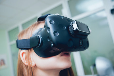Eye treatment. Patient in virtual reality goggles.