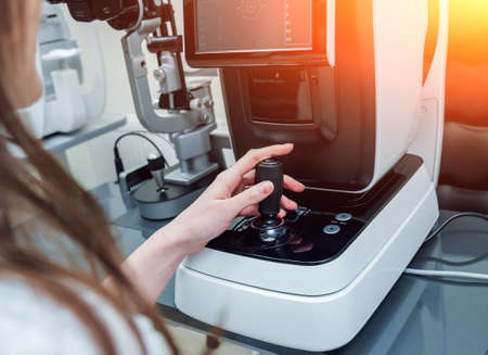 Refractometry and keratometry. Refraction test. Modern Optometry equipment.の写真素材