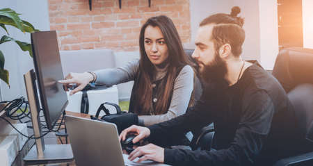 Woman adviser with a businessman. In the officeの写真素材