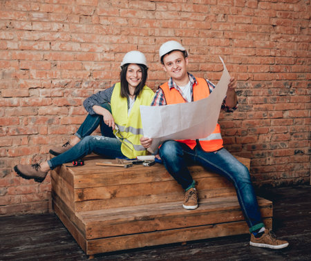 Happy couple making repairs to their home.