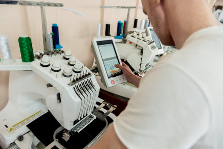 Fabric industry production line. Textile factory. Working tailoring process