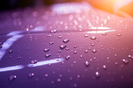 Water drops on violet background. Car details