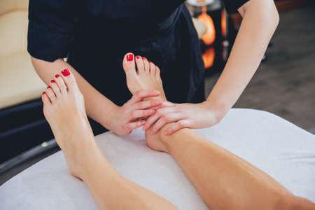 Young girl is relaxing in the spa.の写真素材