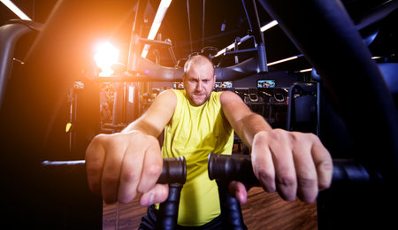 Disabled man training in the gym of rehabilitation center
