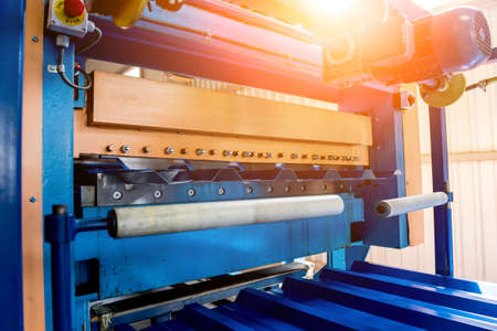 Metal sheet forming machine at the modern metalwork factory.の写真素材