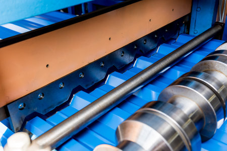 Metal sheet forming machine at the modern metalwork factory.