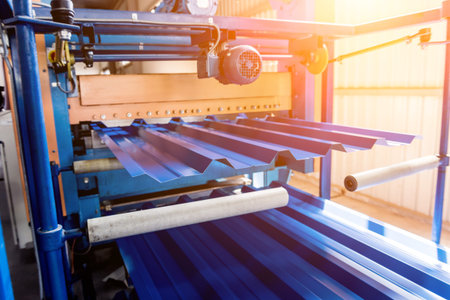 Metal sheet forming machine at the modern metalwork factory.